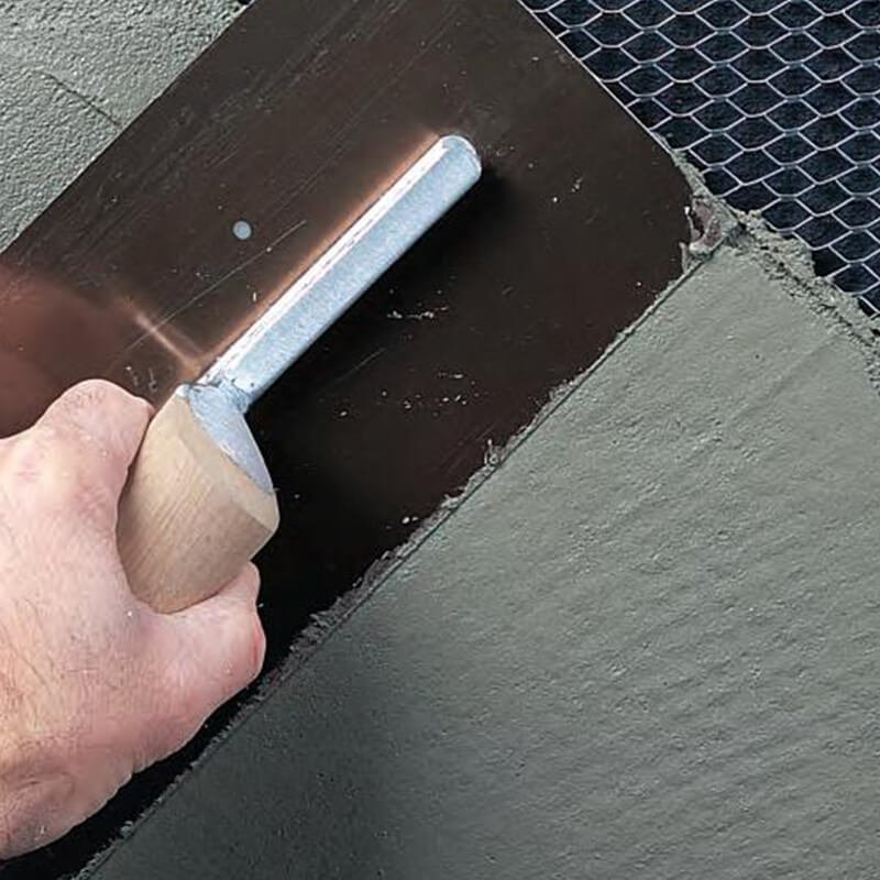 GoMix PB02 base coat adhesive - workers installing EPS boards and embedding glass fiber mesh