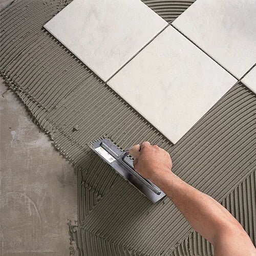 Tile adhesive application